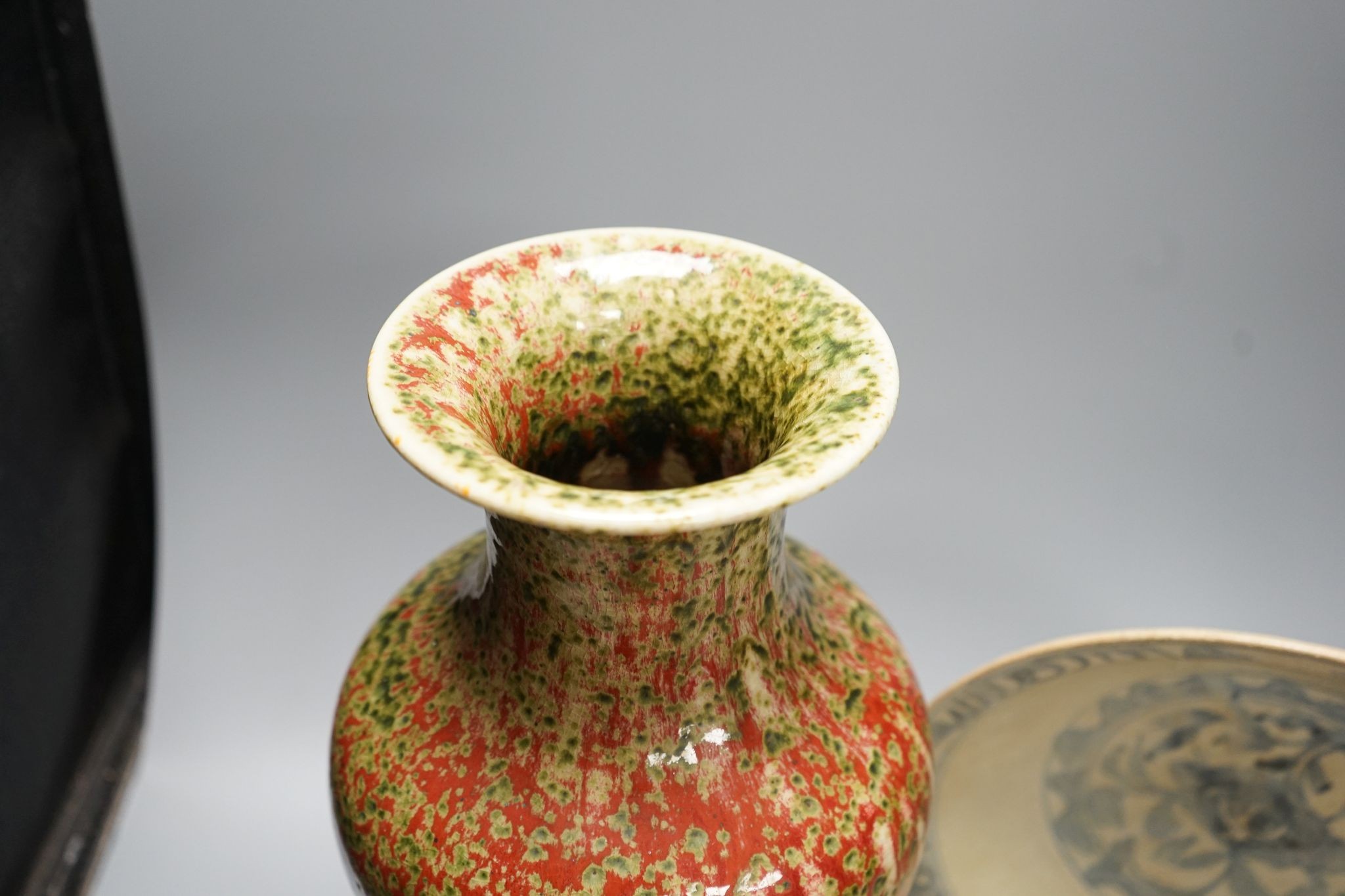 A Chinese flambe vase and two Ming dishes, vase 36cm